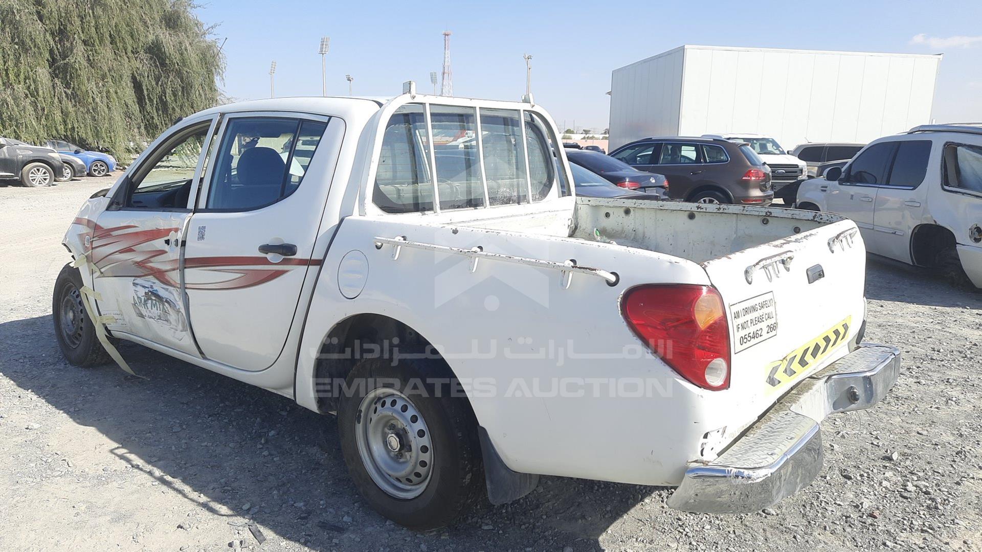 2010 MITSUBISHI L 200 VIN: MMBJNKA50AD031418