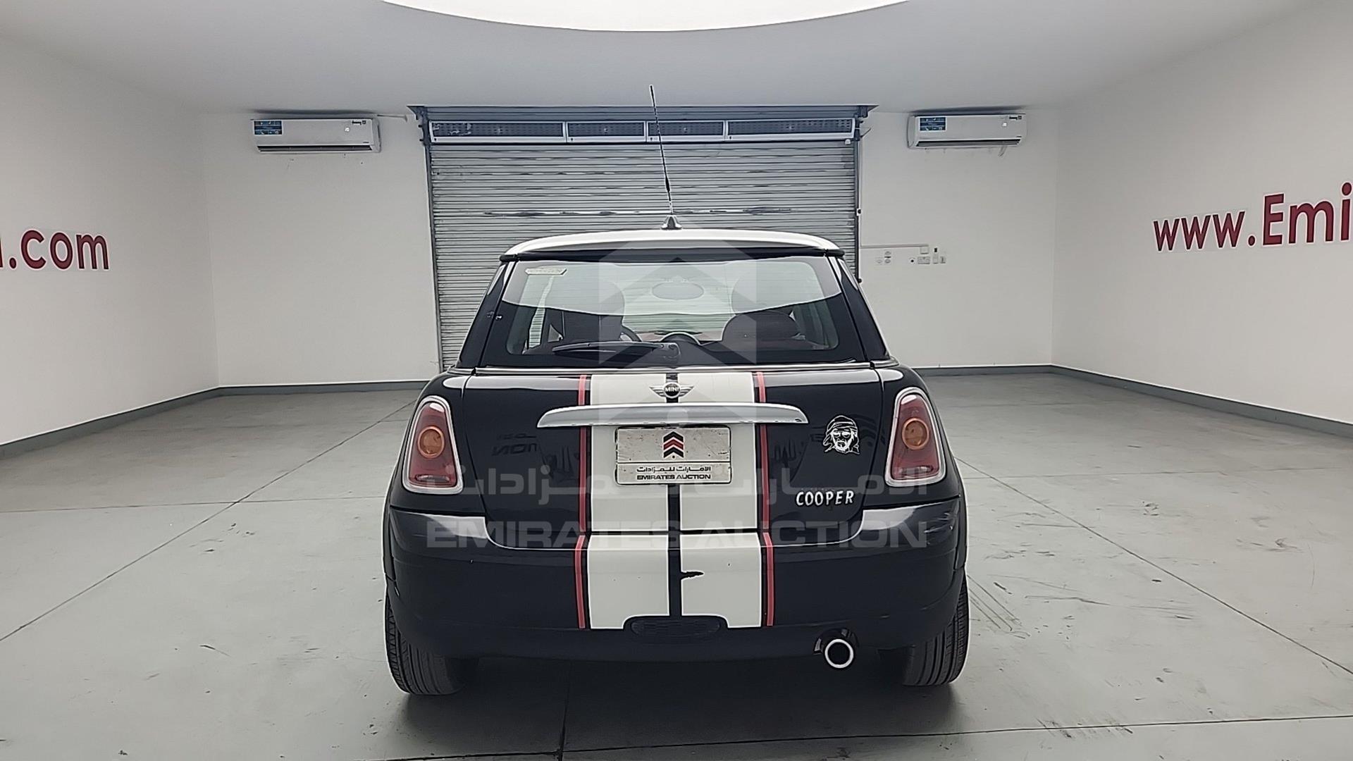 2010 MINI COOPER VIN: WMWMF3C55ATZ25394