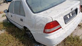 2002 Honda City — Rear Left Angle — Photo 6 — Thumbnail