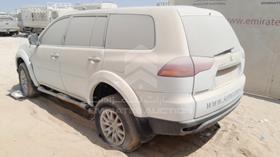 2009 Mitsubishi Pajero — Rear Left Angle — Photo 6 — Thumbnail