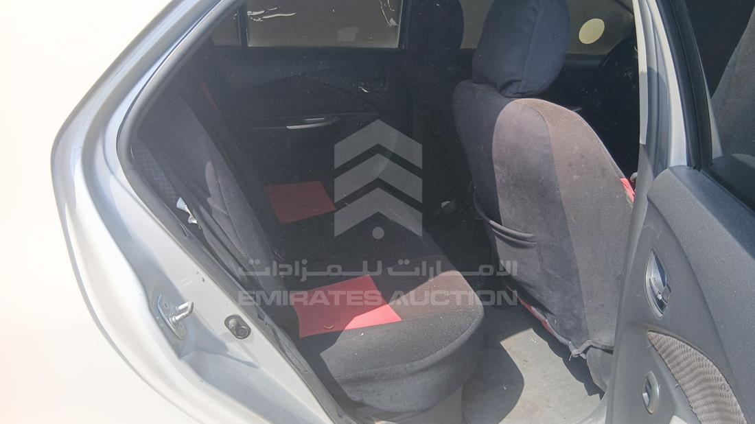 تويوتا ياريس 2008 — زاوية الراكب الخلفي اليمنى — صورة 20