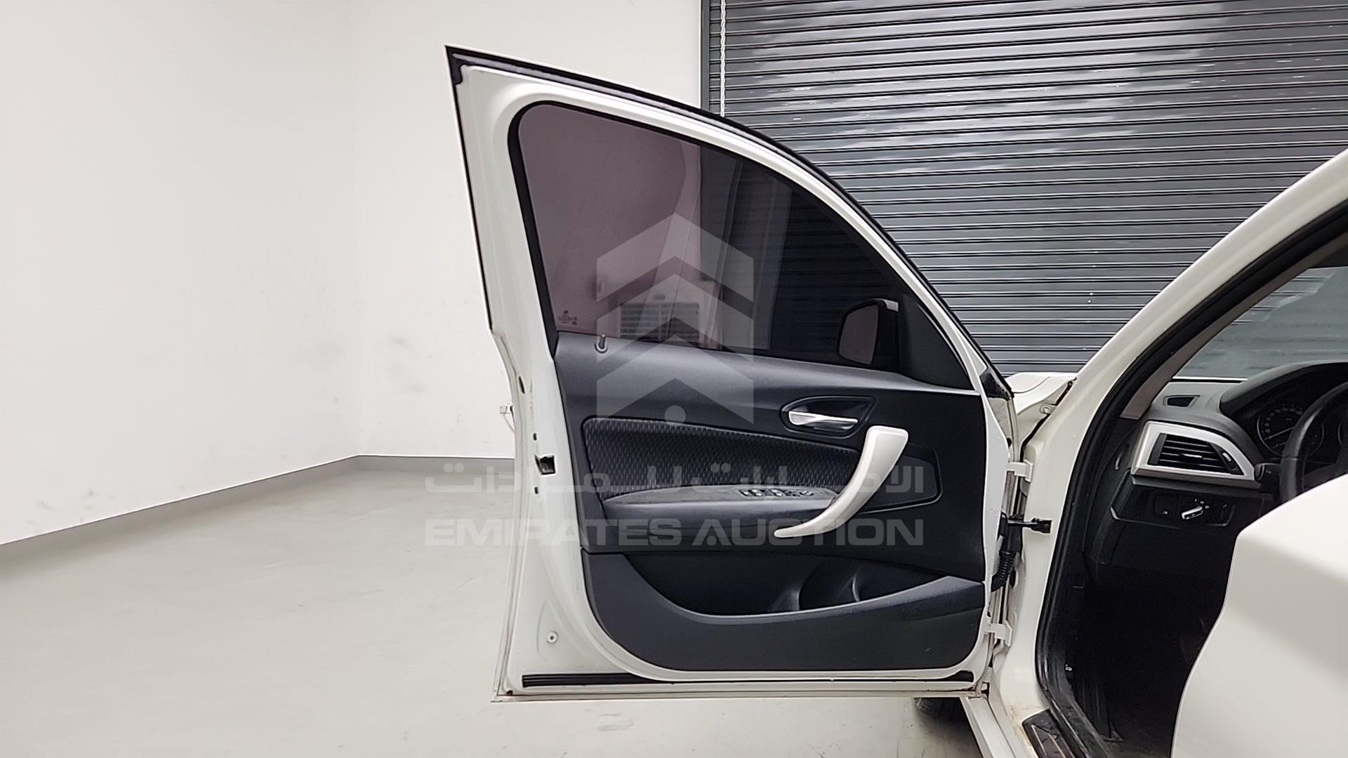 2013 BMW 116 I VIN: WBA1A1107DVV15721