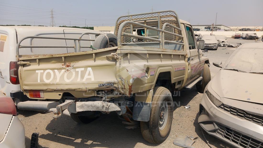 2002 Toyota Land Cruiser Pickup — Rear Right Angle — Photo 8