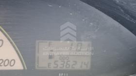 2008 Toyota Yaris — Odometer Reading — Photo 2 — Thumbnail