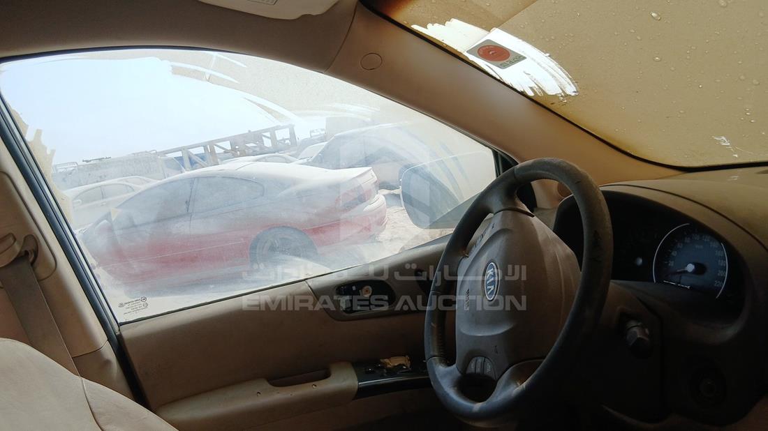 كيا كرنفال 2011 — الباب الأمامي الأيسر — صورة 10