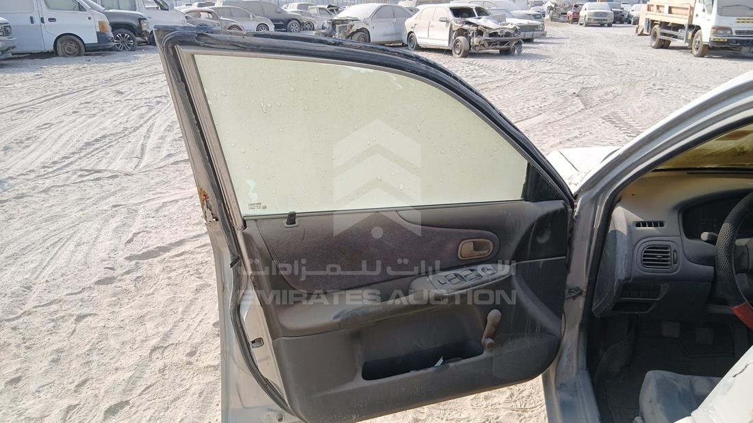 2000 Mazda 323 — Front Left Door — Photo 10
