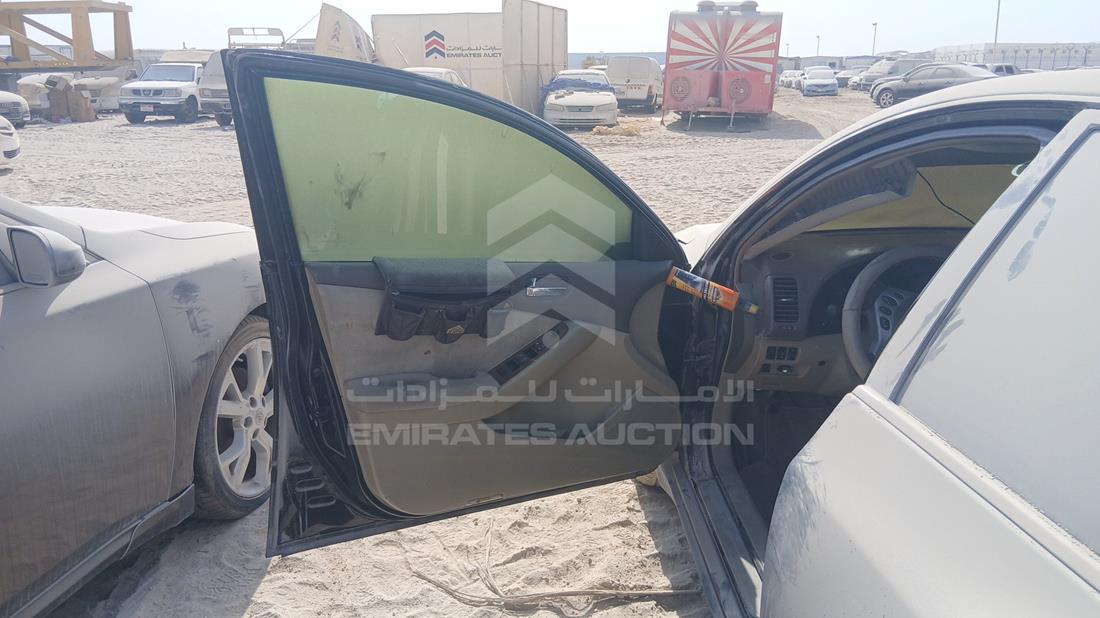 نيسان التيما 2008 — الباب الأمامي الأيسر — صورة 10
