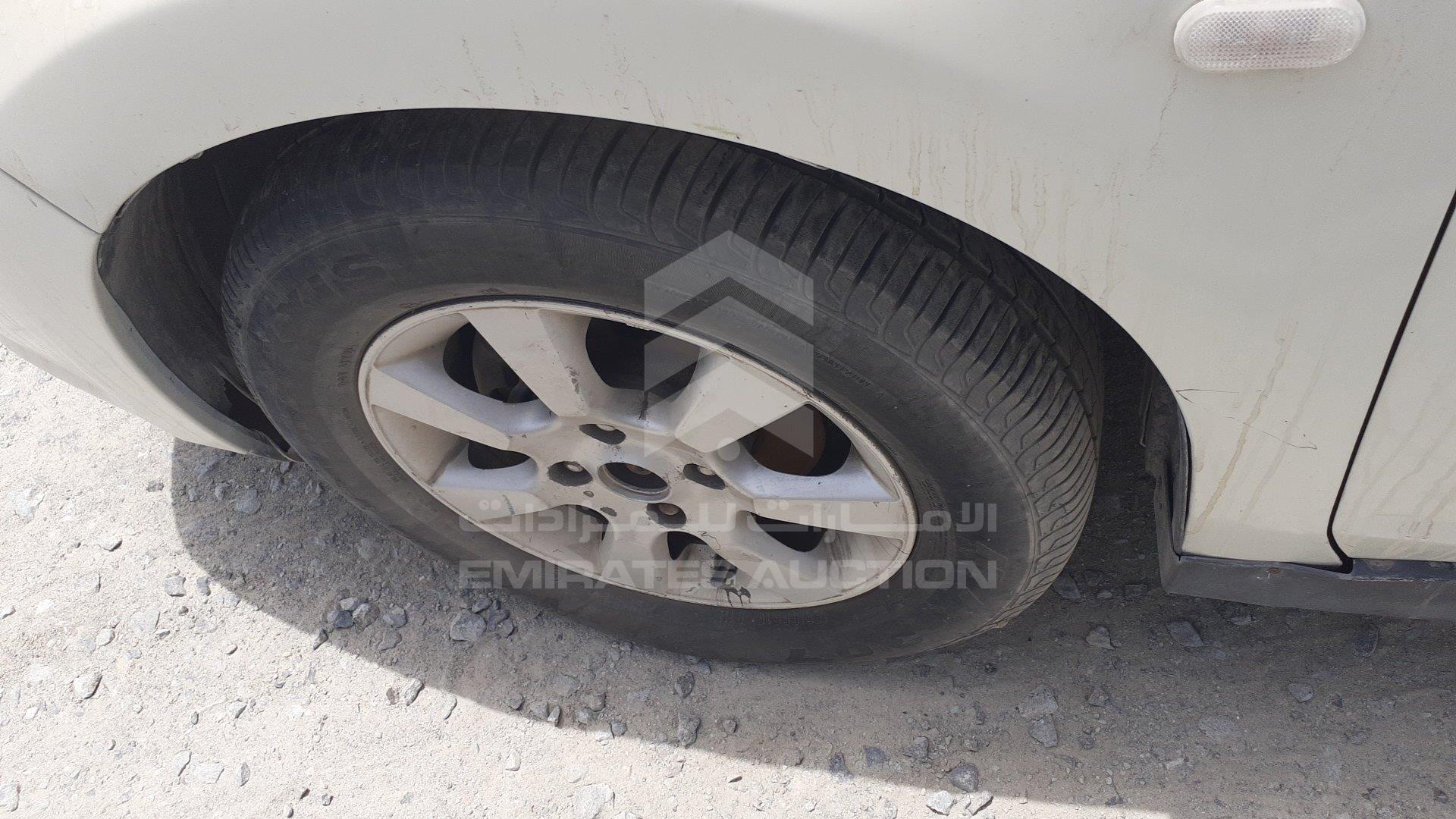 JN1CC13C06T003037 - 2006 Nissan Tiida - #350315