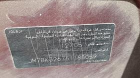 مازدا 3 2006 — رقم الشاسيه على الهيكل — صورة 2 — صورة مصغرة